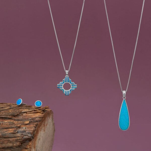 Rhodium Plated Synthetic Blue Opal Elongated Pear Pendant - alternate view 3