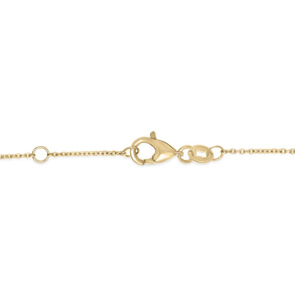 Yellow gold bracelet clasp and chain link detail with alternating gemstone stations