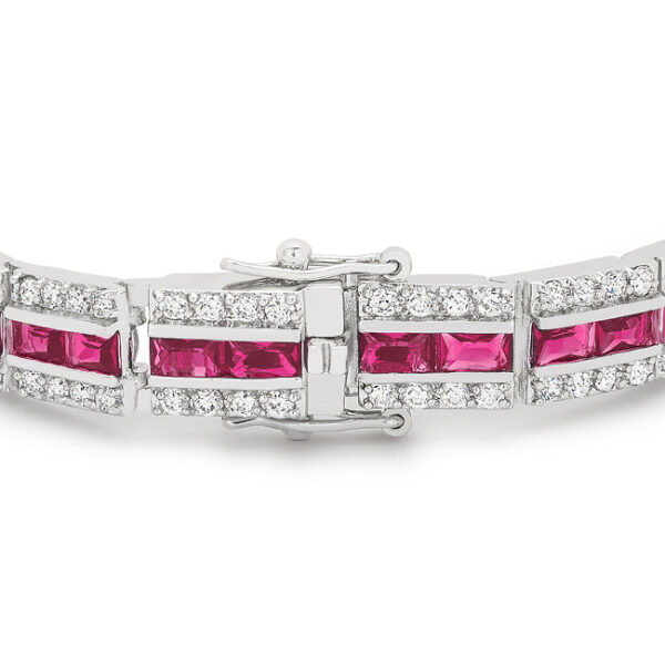 Rhodium plated over lead free alloy (brass) red cubic zirconia bracelet with prong settings and a lock clasp.
