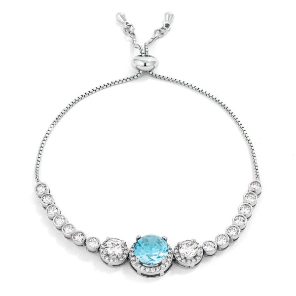 Graduated light aqua and clear round cubic zirconia bolo style tennis bracelet in silver tone over lead free alloy (brass).
