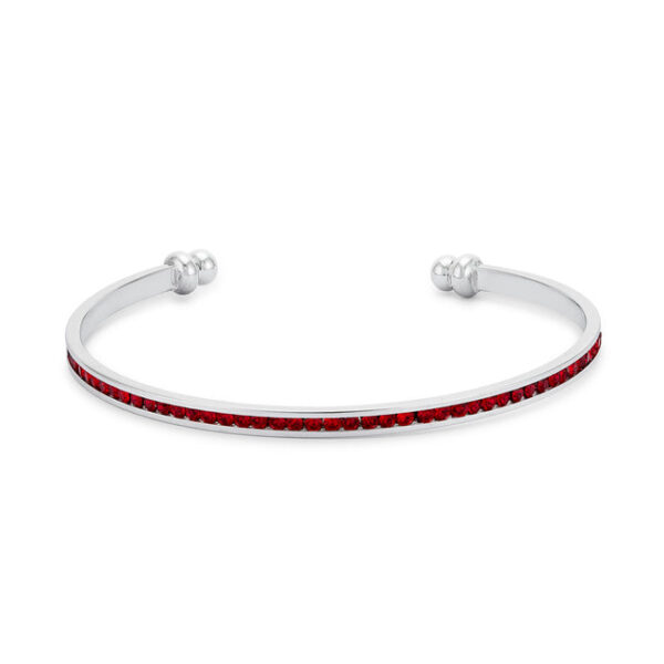 Rhodium plated over lead free alloy (brass) cuff with channel-set round ruby-colored cubic zirconia.