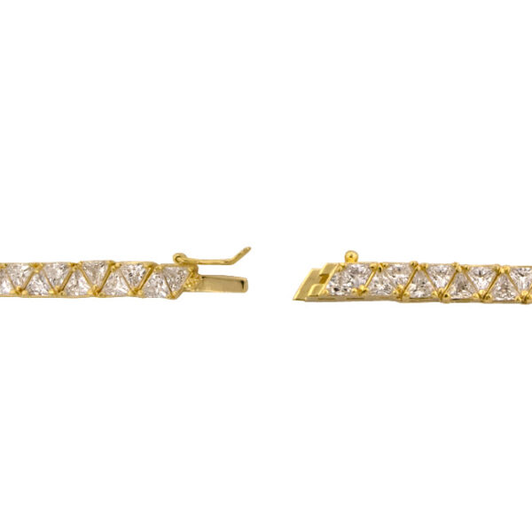 Close-up of the box clasp with safety catch on the necklace's goldtone finish plated over gold tone chain