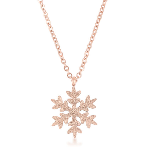 Snowflake necklace in gold and stainless steel.