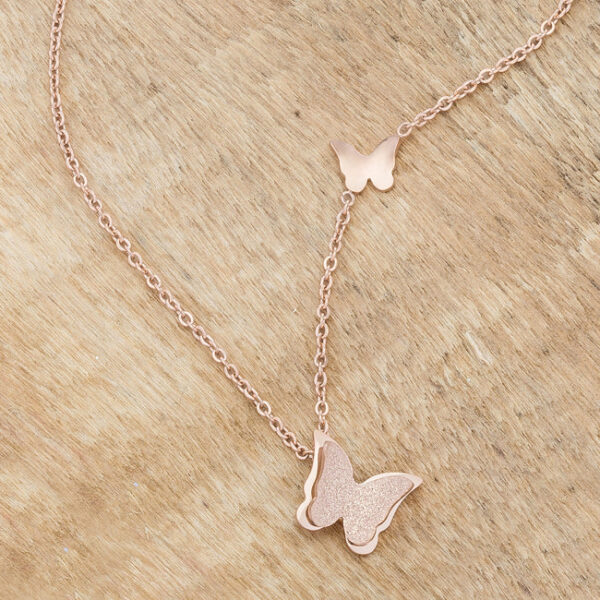 Delicate rosegold plated over stainless steel butterfly necklace with an 18-inch chain and 2-inch extender.
