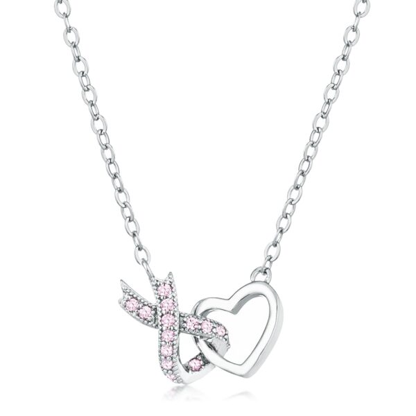 Pink pave-set cubic zirconia interlocking heart ribbon pendant in silver tone over brass.