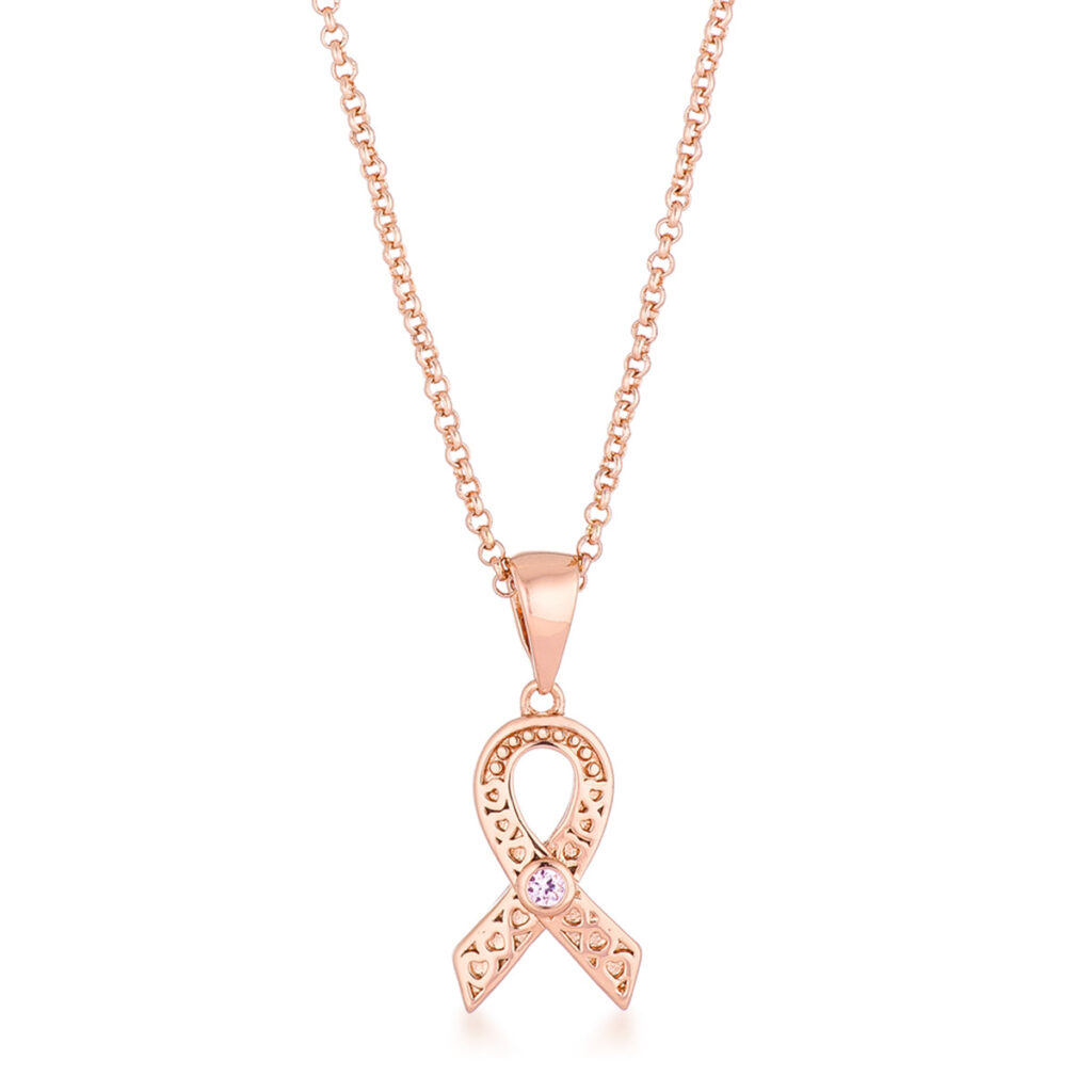 Heart filigree breast cancer awareness ribbon pendant with pink round cubic zirconia and 0.015 ct total stone weight.