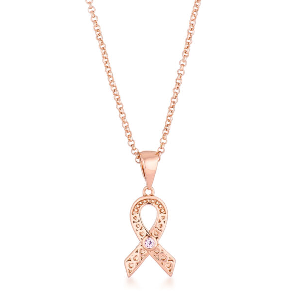 Heart filigree breast cancer awareness ribbon pendant with pink round cubic zirconia and 0.015 ct total stone weight.