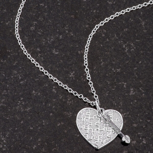 Heart and arrow cubic zirconia pendant with rhodium plated over lead free alloy (brass)