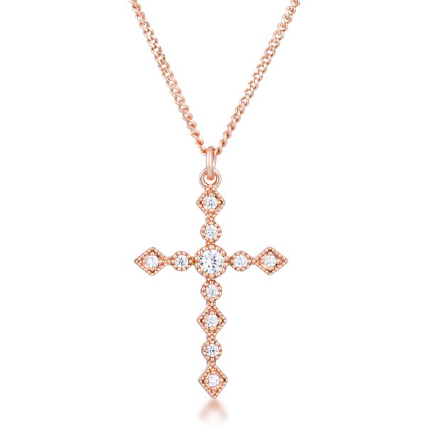 Dainty Art Deco cross pendant in rose gold plated over brass with clear cubic zirconia measuring 1.25 mm.