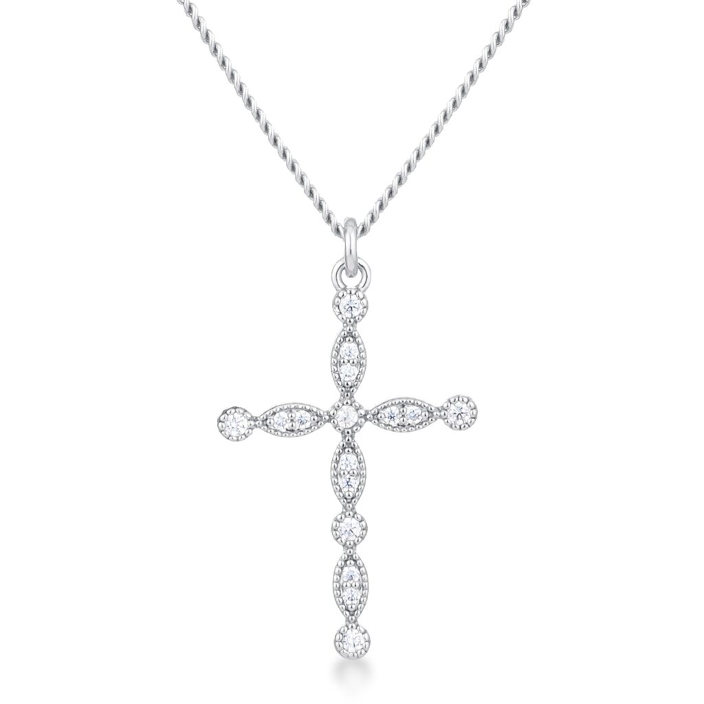 Delicate vintage cross pendant in silver tone over brass with clear cubic zirconia