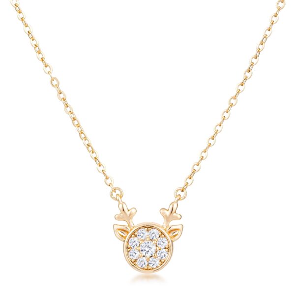 Reversible reindeer pendant with champagne cubic zirconia, an 8mm stone, and sapphire.