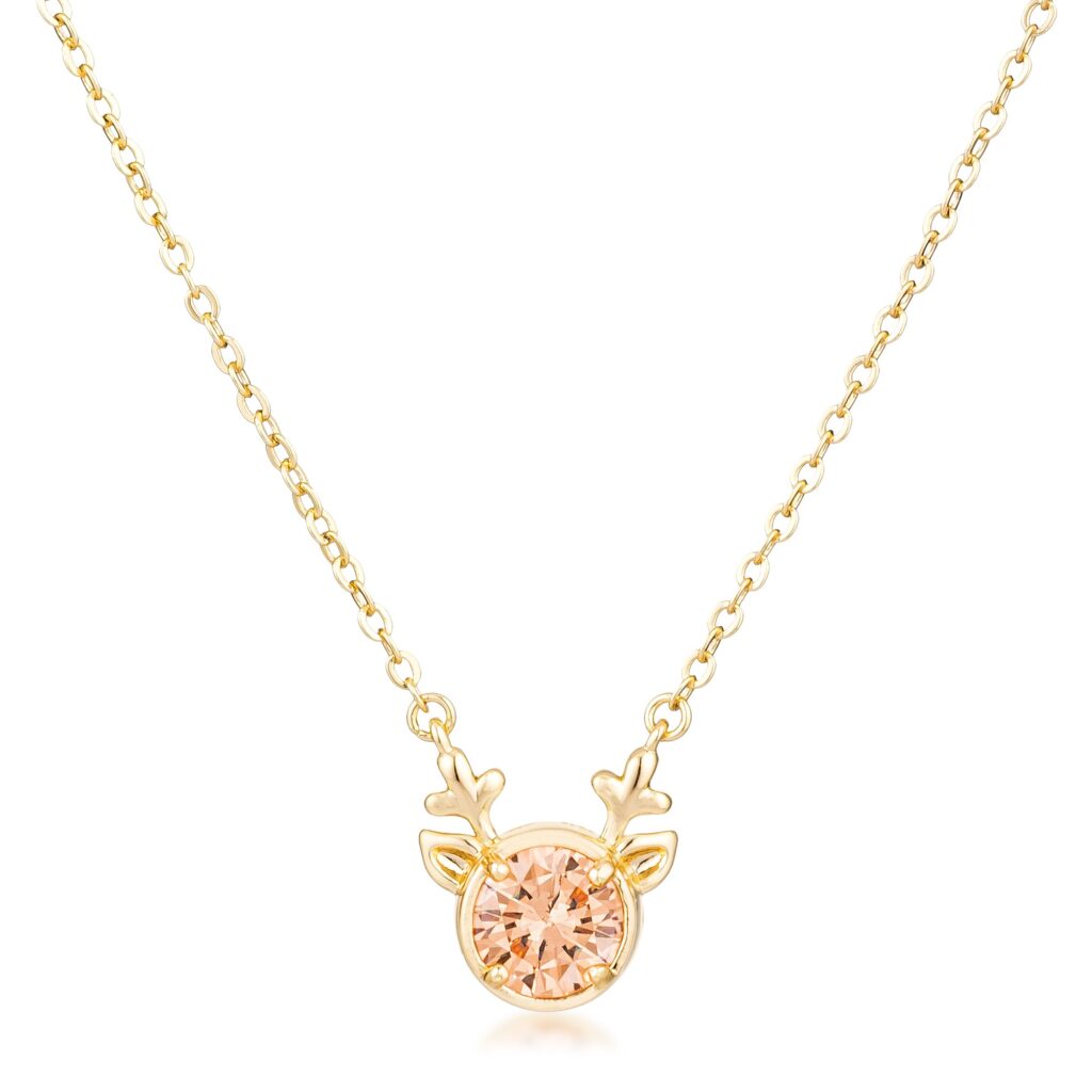 Reversible champagne cubic zirconia reindeer pendant in gold tone over brass.