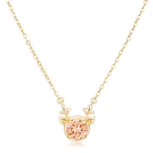 Reversible champagne cubic zirconia reindeer pendant in gold tone over brass.