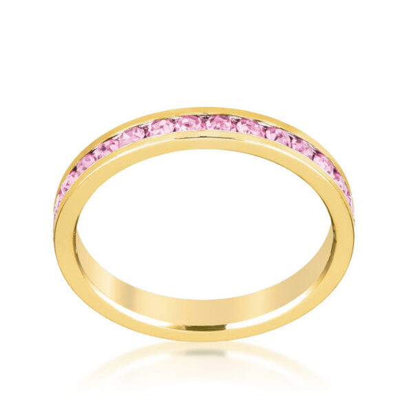 Clear round Swarovski Crystals in a channel-set 3-stone ring with gold tone finish over lead free alloy (brass).