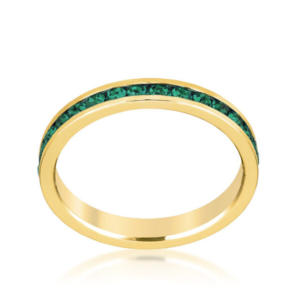 Three clear, round Swarovski Crystals in a channel-set eternity ring with gold tone finish over lead free alloy (brass).