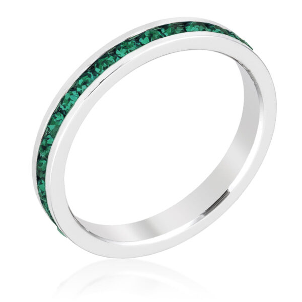 Three clear, round Swarovski crystals in a channel setting on a ring with rhodium plating over lead free alloy (brass).