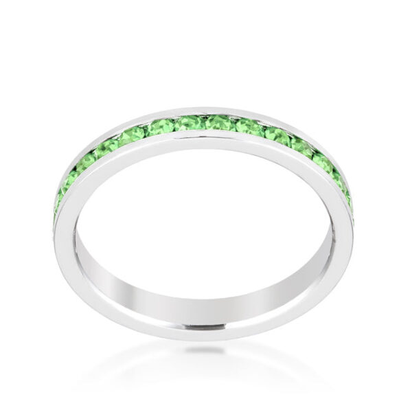Clear round peridot Swarovski Crystals in a channel-set ring, rhodium plated over lead free alloy (brass).