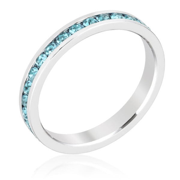 Three clear round aquamarine Swarovski Crystals in a channel setting on a rhodium plated over lead free alloy (brass) ring.