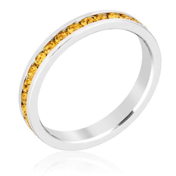 Light pink round Swarovski Crystals in a channel-set eternity ring, rhodium plated over lead free alloy (brass).