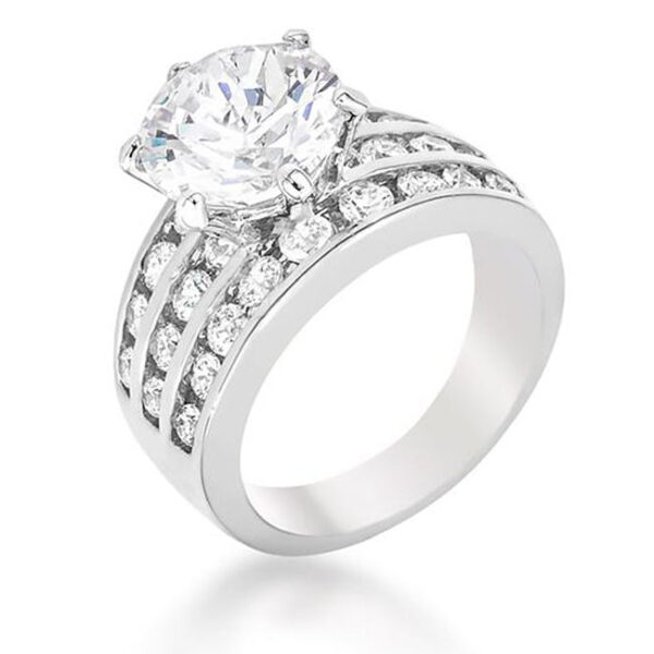 The ring with round simulated cubic zirconia in a channel setting, rhodium plated over lead free alloy (brass).