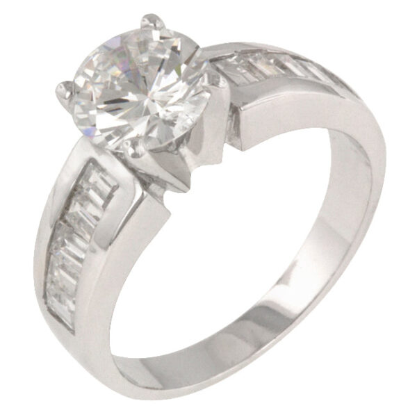 Rhodium plated over lead free alloy (brass) ring with baguette and round cubic zirconia in a channel setting.