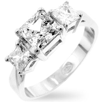 Rhodium plated over .925 sterling silver ring with three 6 Mm Princess-cut cubic zirconia stones in prong settings.