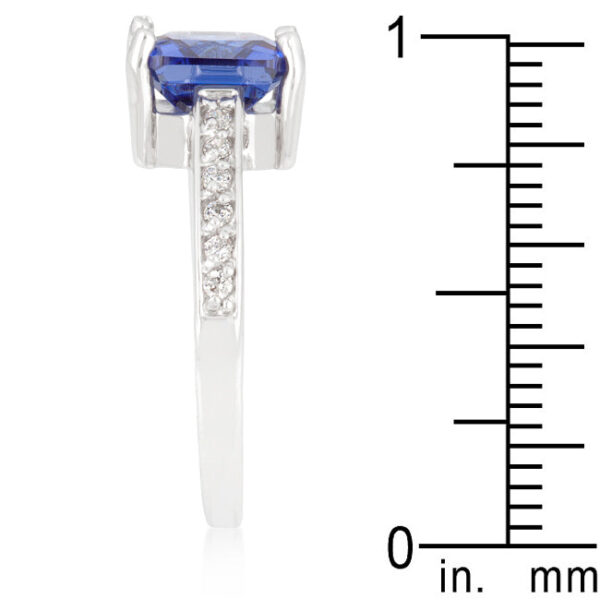 Rhodium plated over lead free alloy (brass) cubic zirconia ring with green Princess-cut stone detail in prongs.