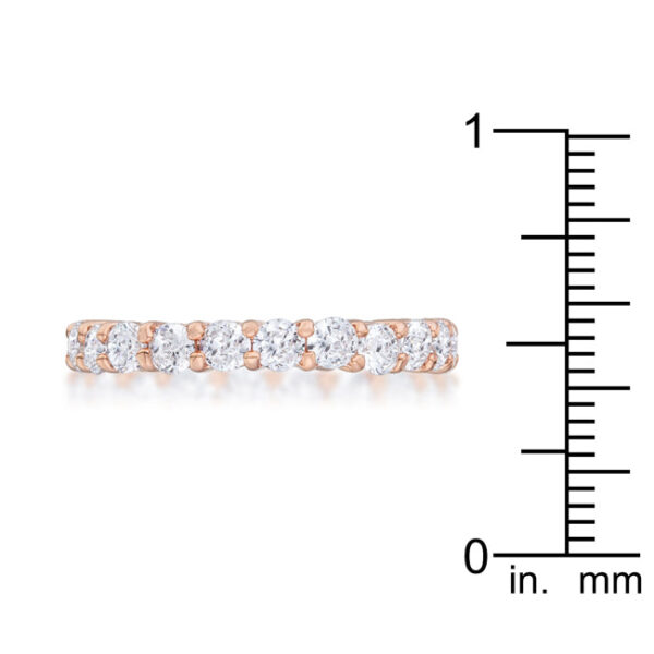 Round 3 Mm cubic zirconia accents in prongs on a rose gold tone finish over lead free alloy (brass) band ring.