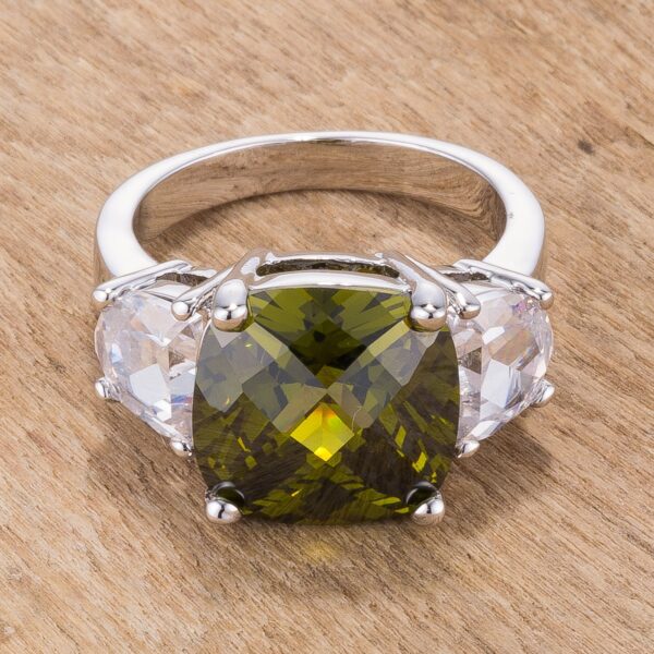 Contemporary 3-stone ring with green cushion-cut cubic zirconia and rhodium plating over lead free alloy (brass).