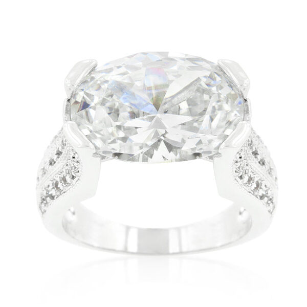 Three purple oval cubic zirconia stones in prongs on a rhodium plated over lead free alloy (brass) ring.