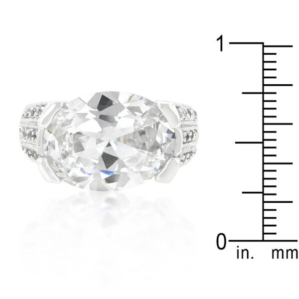 Purple cubic zirconia 3-stone ring with 22.5 ct total stone weight, rhodium plated over lead free alloy (brass).
