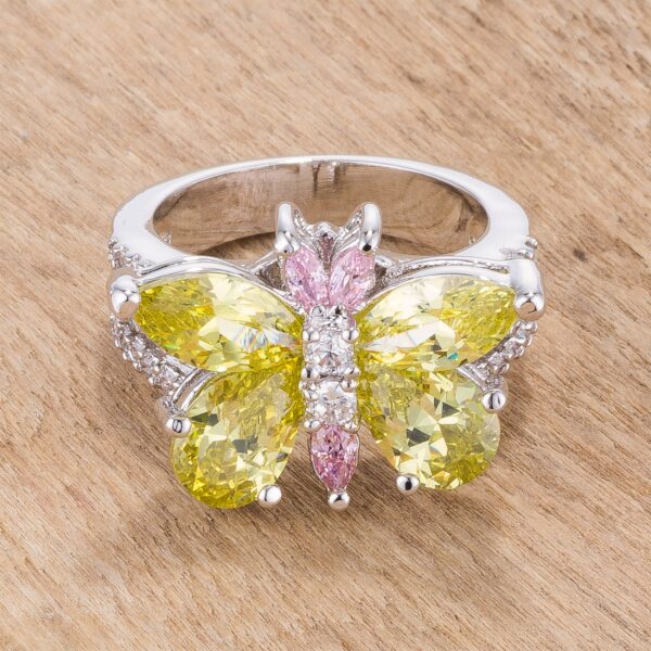 White oval cubic zirconia butterfly ring in prongs, rhodium plated over lead free alloy (brass)