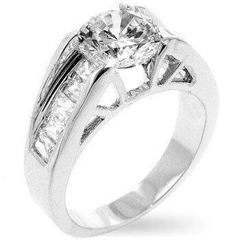 Clear cubic zirconia engagement ring with baguette and round cuts in a channel setting, rhodium plated over lead free alloy (brass).