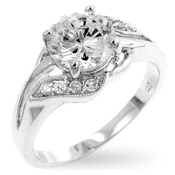 Engagement ring in rhodium plated over lead free alloy (brass) with round cubic zirconia in prongs.