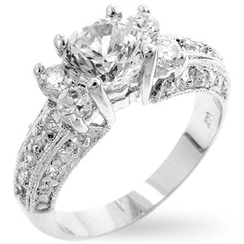 Engagement ring with round cubic zirconia in prongs, 2.1 ct total stone weight, and rhodium plated over lead free alloy (brass).