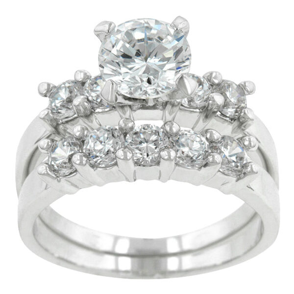 Round cubic zirconia wedding set in prongs with 3.7 ct total stone weight and rhodium plated over lead free alloy (brass).