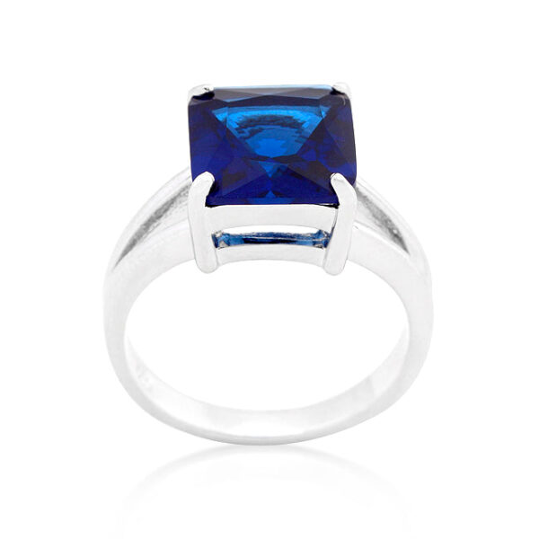 Princess-cut blue sapphire-colored cubic zirconia ring with prongs and rhodium plated over lead free alloy (brass).