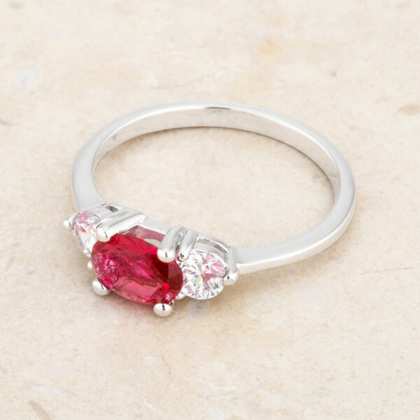 2mm-wide oval cubic zirconia ring in fuchsia, rhodium plated over lead free alloy (brass), with prongs.