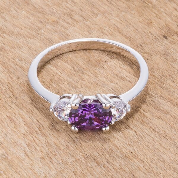 Three-stone bridal ring with genuine oval cubic zirconia in prongs and rhodium plated over lead free alloy (brass).
