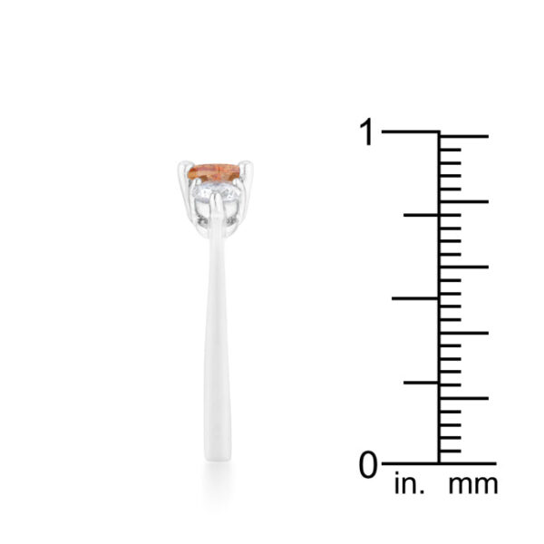 Oval champagne cubic zirconia in a prong setting on rhodium plated over lead free alloy (brass) ring.