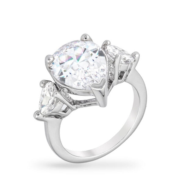 Pear triplet ring with three prong-set cubic zirconia stones, rhodium plated over lead free alloy (brass).