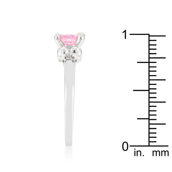 Pink 3-stone bridal ring with round cubic zirconia held in prongs.