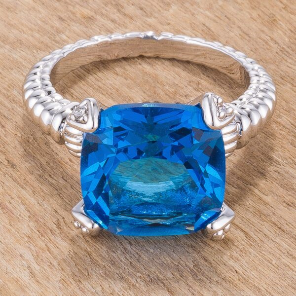 Rhodium plated ring with aqua cushion-cut cubic zirconia.