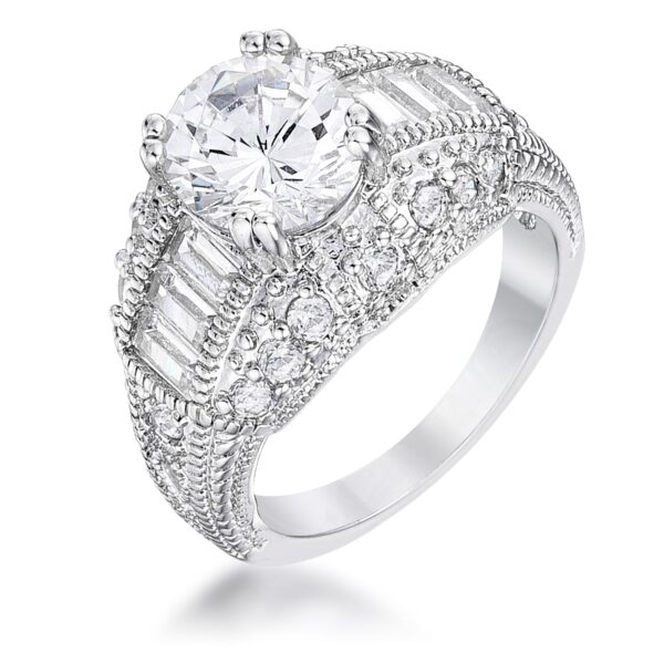 Rhodium plated over lead free alloy (brass) ring with baguette and round cubic zirconia in a prong setting.