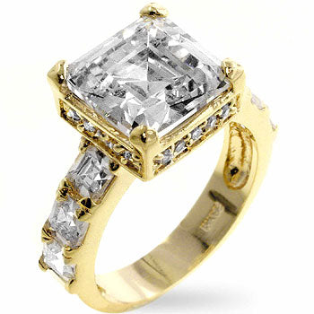 Music box ring with Asscher and round cubic zirconia in prong settings and gold tone finish over lead free alloy (brass).