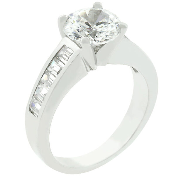 Classic engagement ring in rhodium plated over lead free alloy (brass) with genuine cubic zirconia in baguette and round cuts.