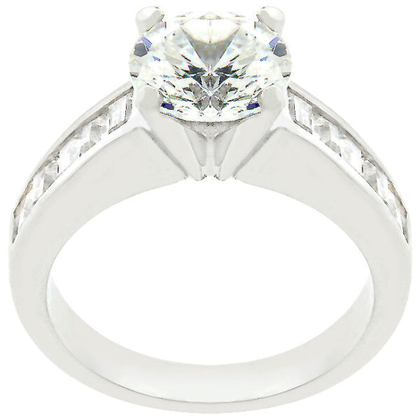 Rhodium plated over lead free alloy (brass) engagement ring with genuine cubic zirconia, baguette and round cuts, and a channel setting.