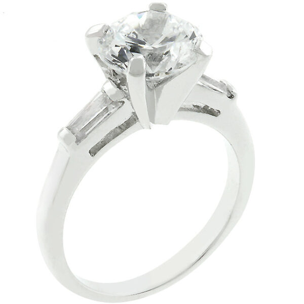 White 3-stone cubic zirconia ring with baguette and round cuts in bar settings, rhodium plated over lead free alloy (brass).