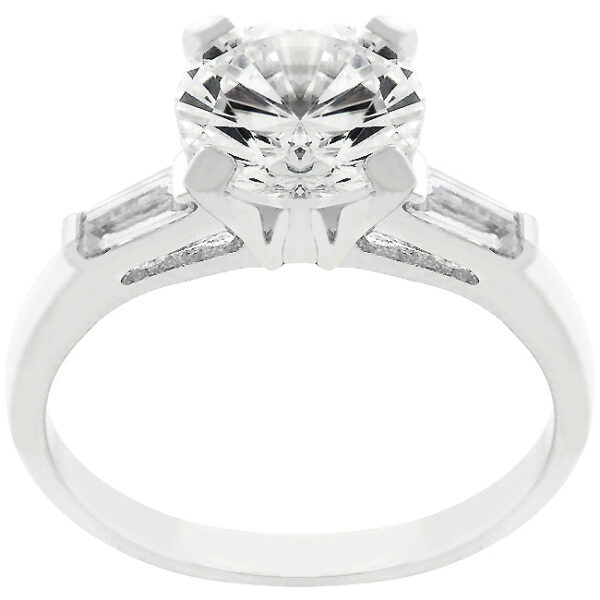 Rhodium plated over lead free alloy (brass) white ring with 3 cubic zirconia stones in baguette and round cuts.