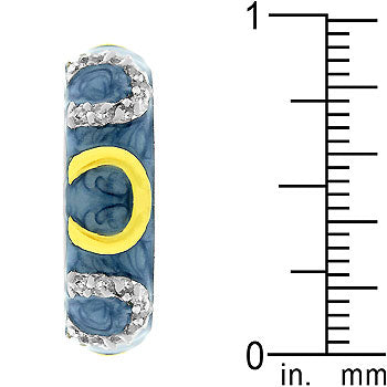 Blue enamel ring with prong-set cubic zirconia, a horseshoe motif, and a gold tone finish.